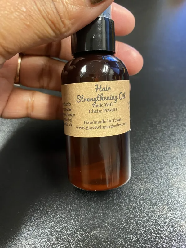 HAIR STRENGTHENING OIL WITH CHEBE POWDER image 0